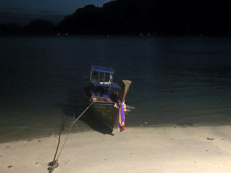 Boat moored at night