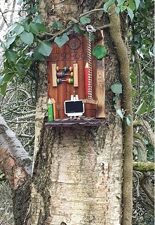 Tiny elf doors on a tree
